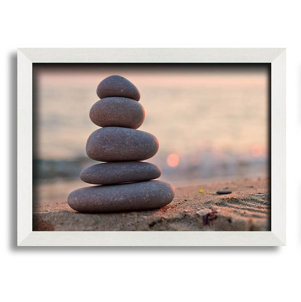 Gerahmter Fotodruck Zen Stones Stacked Up On Beach