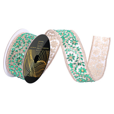 2" x 5yd Flower and Leaf Jewel Wired Ribbon with Gold Mesh and Trim. Gold Mesh Backing. Measuring 2 inches in width and 5 yards in length, it's perfect for a variety of festive projects.