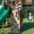 Backyard Discovery Skyfort II Cedar Wood Swing Set with Spiral Tube Slide, Clubhouse, Crow's Nest, and Picnic Table