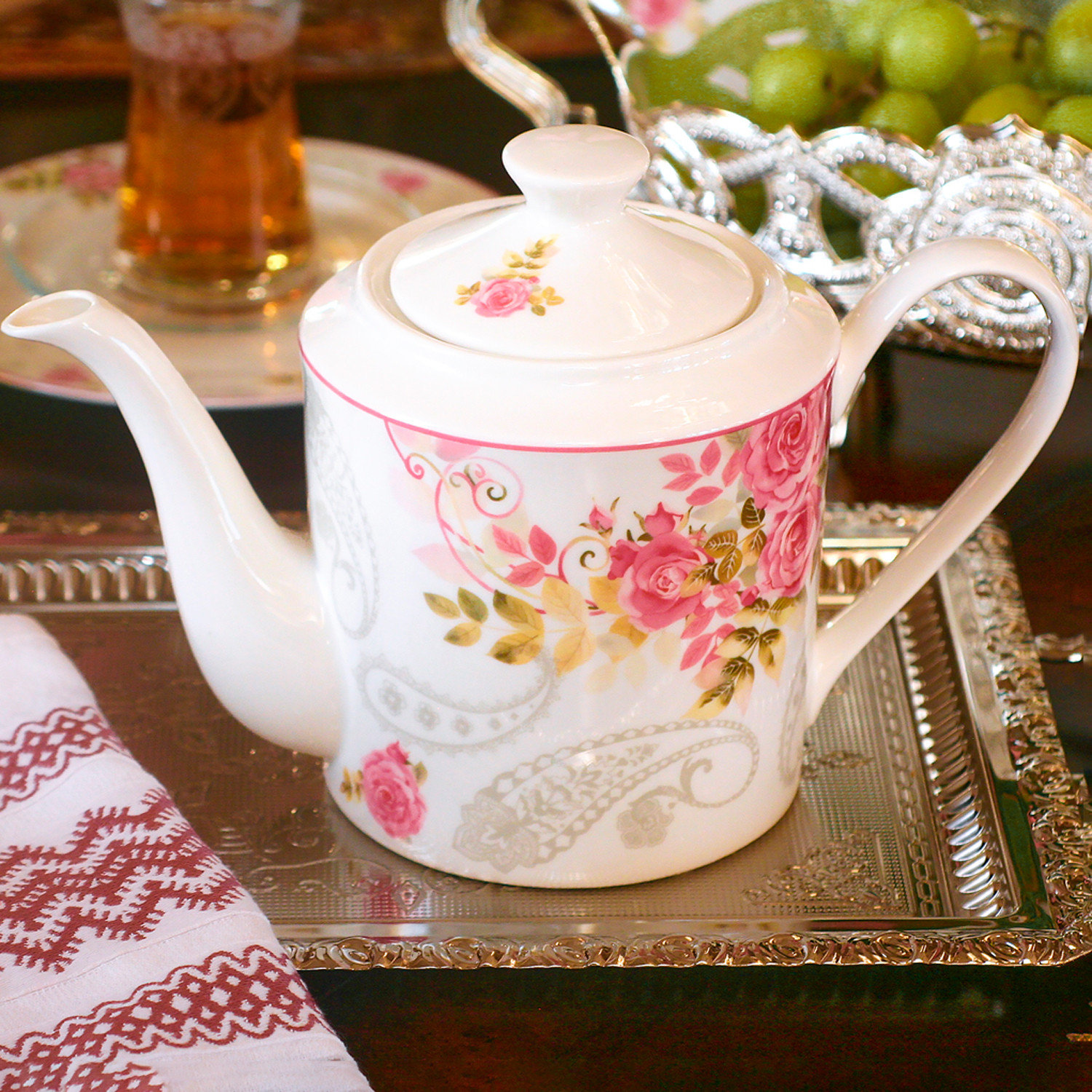 https://assets.wfcdn.com/im/35973190/compr-r85/2368/236855959/stp-goods-rose-garden-3719oz-floral-teapot.jpg