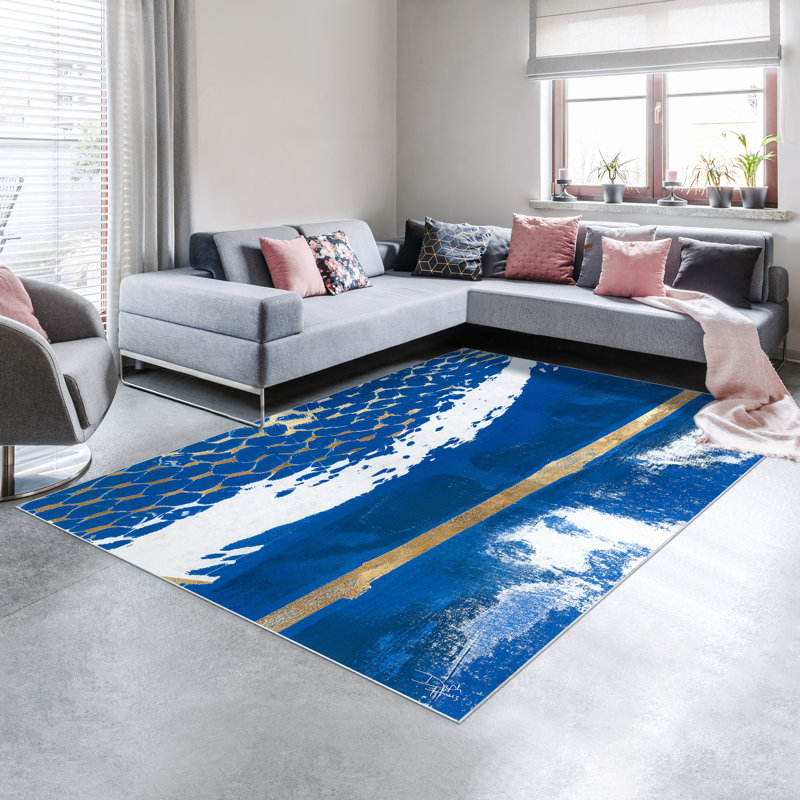 Tapis rectangulaire Divyan avec envers antidérapant