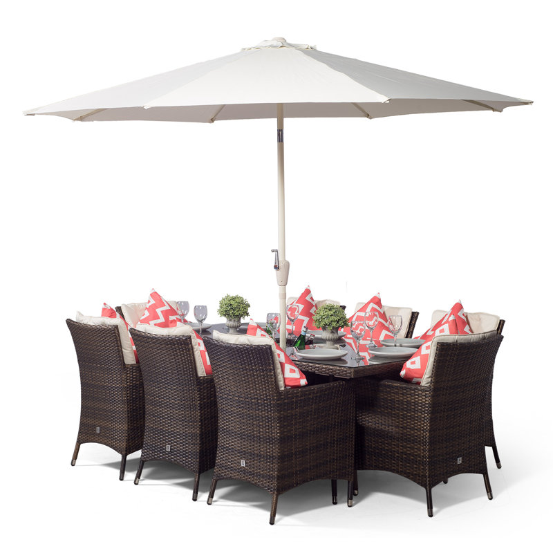 Karcher 8 - Person Patio Dining Set Umbrella Hole Included Rectangular Table with Cushions Included, Brown