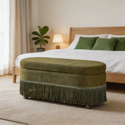 Oval Upholstered Storage Ottoman with Fringe Trim & Lift-Top Lid - 39"L x 16"W x 17"H, Multi-Functional Footrest & Hidden Storage for Living Room or Bedroom - Green Fabric with Metal Frame