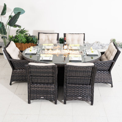 Ensemble repas de patio en osier pour 6 personnes avec table ovale Omied, coussins inclus