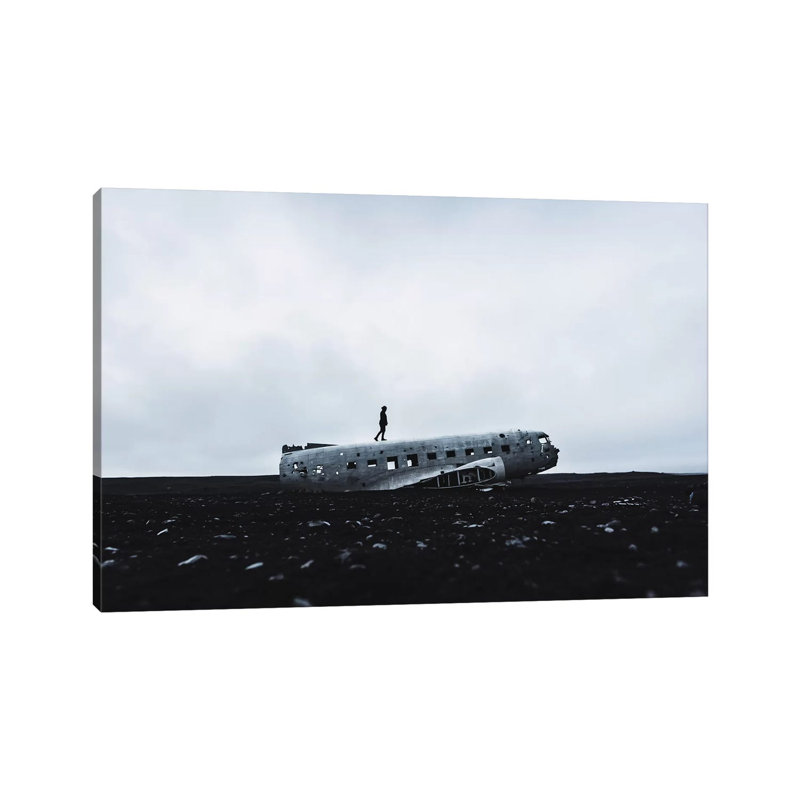 Man Walking Plane Wreck by James Vodicka - Wrapped Canvas Gallery-Wrapped Canvas Giclée, 20.32 cm H x 30.48 cm W