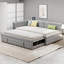 Lit de jour double en L doux et rembourré gris avec couchette simple escamotable et ports USB pour chambre d'amis