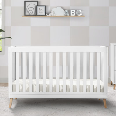 Delta Children Essex 4-Piece Nursery Furniture Set includes a 4-in-1 Convertible Crib, Changing Table, Changing Pad and Crib Mattress, Bianca White/Natural