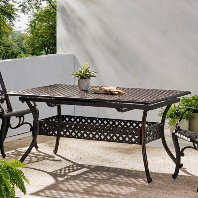 Jenisa Rectangular Metal Extendable Outdoor Dining Table With Umbrella Hole , 64'' in. W 37.50'' in. D