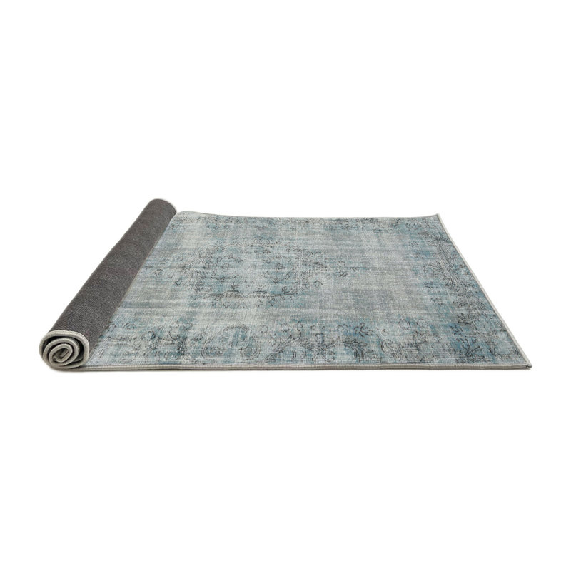 Tapis gris Shultis, Rond 6 pi