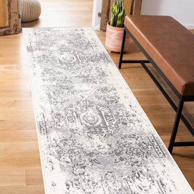 Tapis gris floral en polypropylène tissé à la machine 5 pi x 7 pi