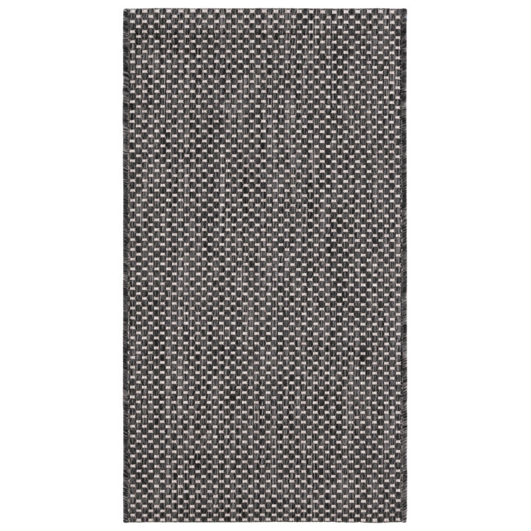 Sezis Performance Solid Color Indoor/Outdoor Area Rug