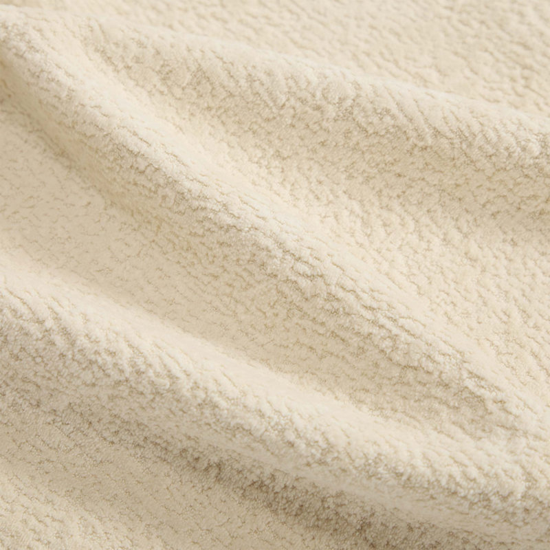 Canapé d'angle Chenille Cloud avec pouf amovible et finitions à pompons