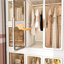 Grande armoire de rangement portative avec 8 petites armoires de rangement et 2 tringles de suspension pour les articles. 12, tringles, portes magnétiques. Pour les vêtements, les articles. Pp et abdos forts Rapide à assembler. Blanc