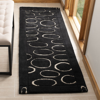 Tapis géométrique en laine et viscose touffeté à la main Jorie