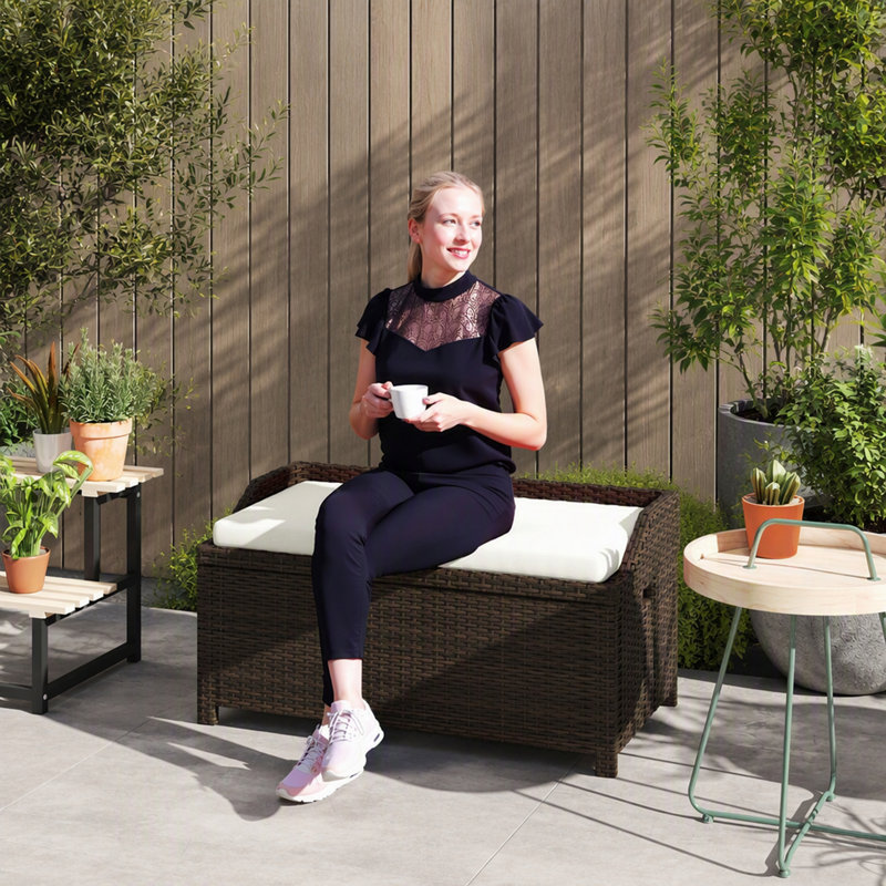 Banc de rangement extérieur en rotin en PE avec doublure imperméable et coussin moelleux
