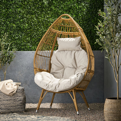Fauteuil moderne en forme de larme pour le confort de votre cour avec panier polyvalent - fini brun