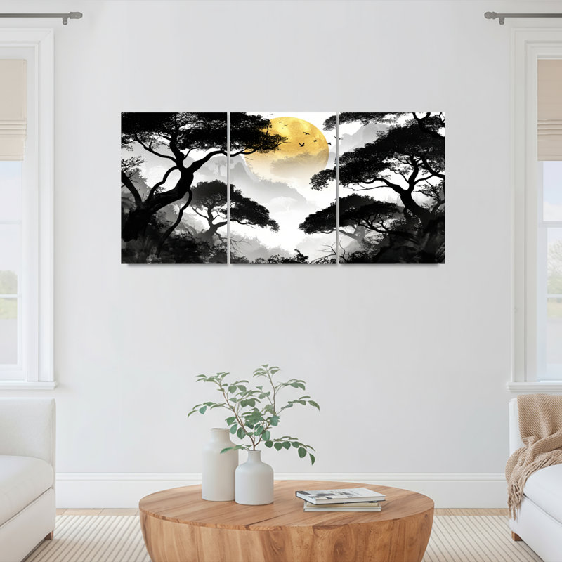 Ensemble de 3 tableaux muraux sur toile tendue représentant la silhouette d'un arbre en noir et blanc avec un soleil doré