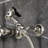 Kingston Brass Heritage Double-Handle 3-Hole Wall-Mount Bridge Kitchen Faucet with Brass Sprayer-93672743