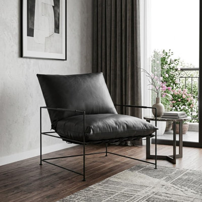  Fauteuil noir en cuir véritable patiné