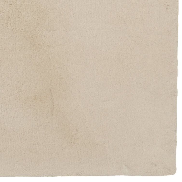 Jalissia Faux Rabbit Fur Hand Tufted Solid Color Rug