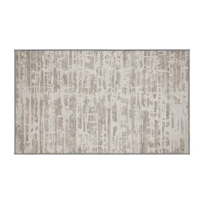 Tapis gris lavable à la machine