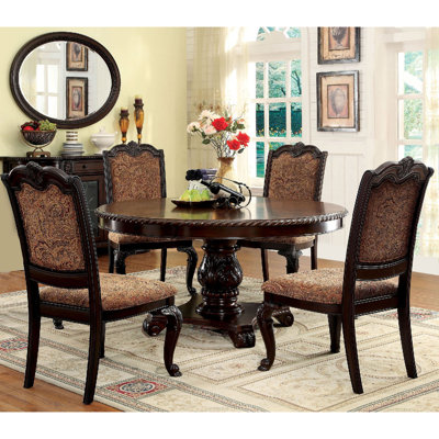 Amandajo Pedestal Dining Set
