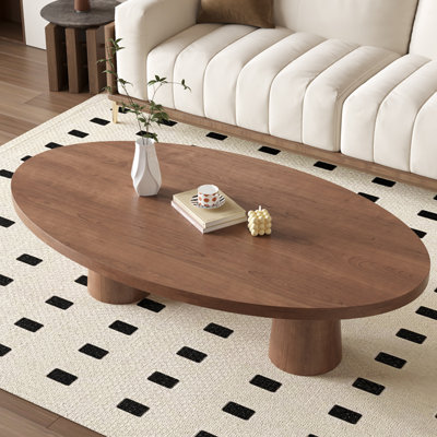 Table basse simple en bois massif de conception ovale