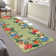 Tapis vert cerise lavable à la machine