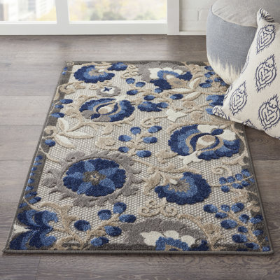 Tapis à motif floral moderne et naturel Newton