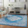 Burnie Oriental Blue/Ivory Area Rug