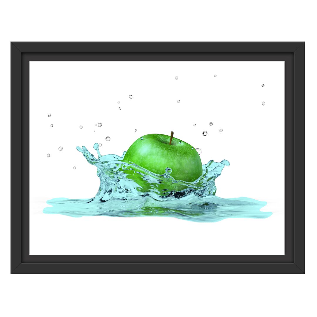 Gerahmtes Wandbild green Apple Apfel fällt in Wasser