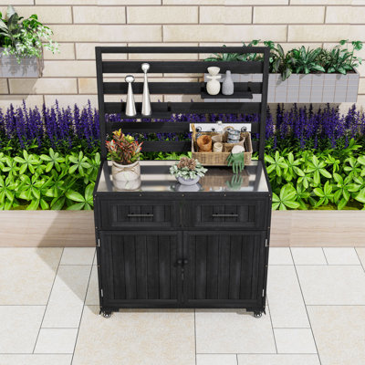 Îlot de cuisine en bois avec plateau, armoire et tiroirs en acier inoxydable