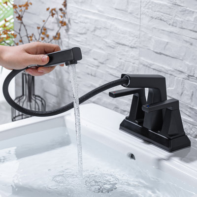 Robinet de salle de bain central noir à 2 poignées avec douchette extractible