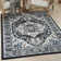 Tapis persan noir ivoire Passion
