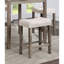 Table de salle à manger à hauteur de comptoir grise et beige avec tabourets très hauts rembourrés en tissu et 4 tabourets en lin