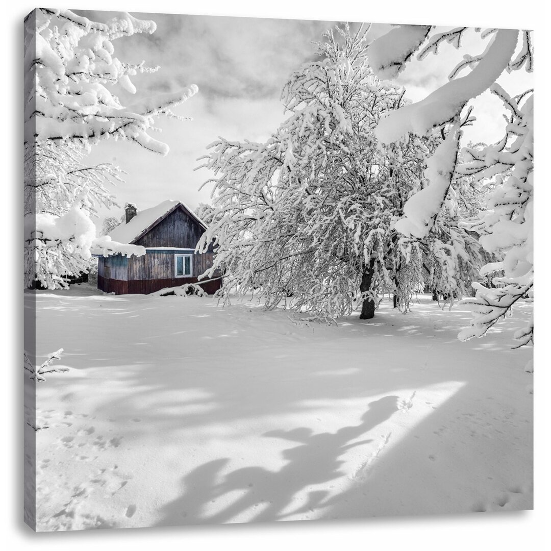 Leinwandbild Einsame Hütte in schöner Winterlandschaft