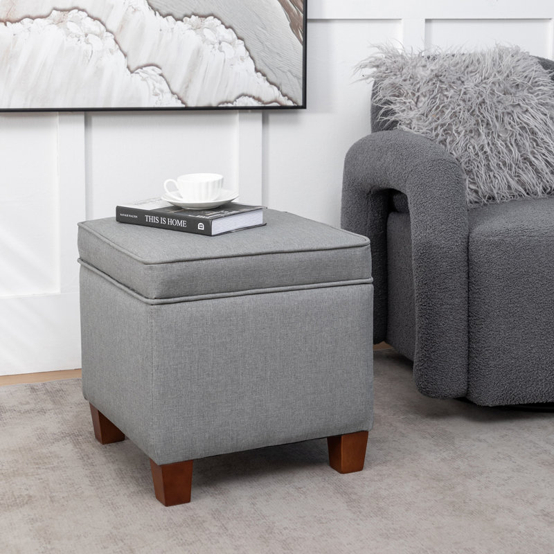Repose-pieds de rangement en tissu avec pieds en bois Kemia, Mélange de polyester gris clair