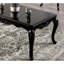 Table basse de style traditionnel avec pieds incurvés en bois massif