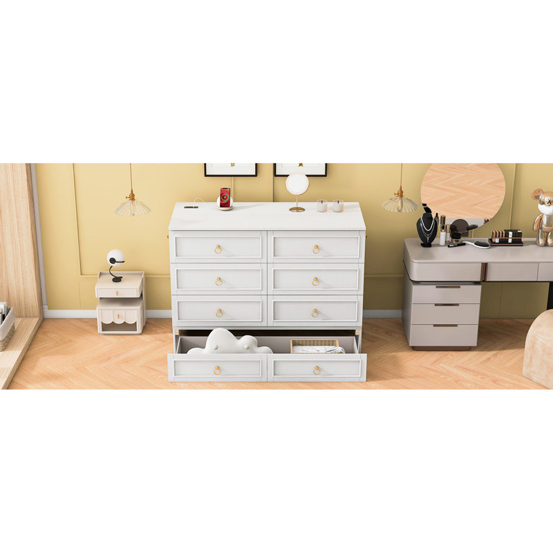 Espace utilisant un lit double blanc avec tiroirs - Compartiments de rangement spacieux et élégants