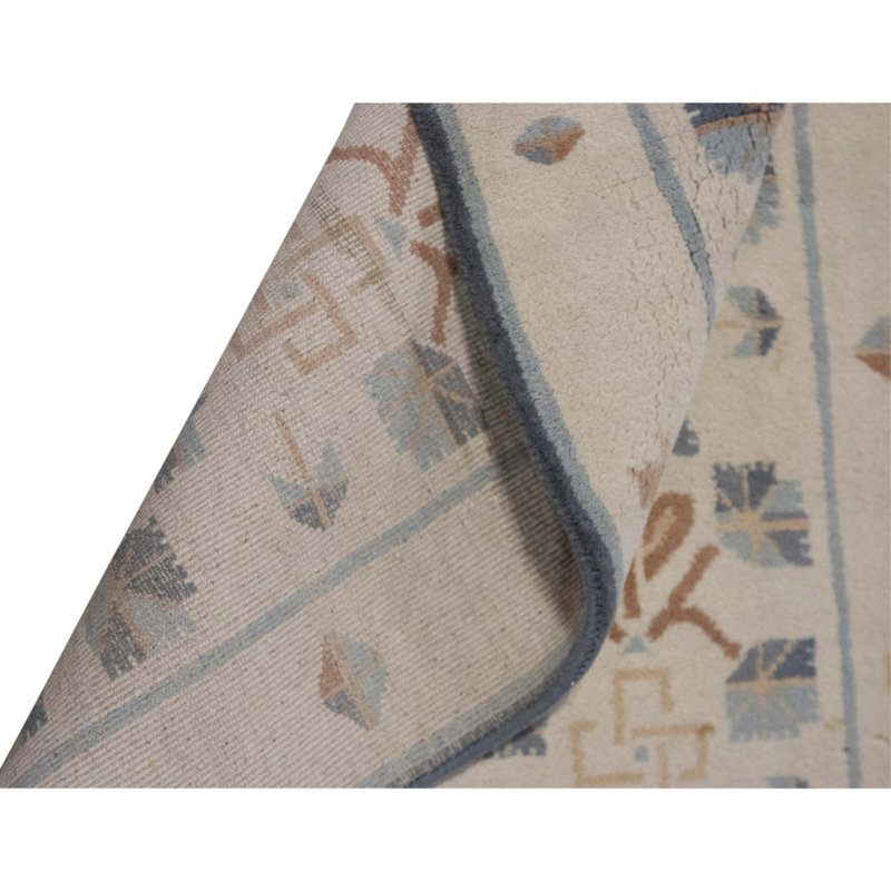 Tapis ivoire noué à la main de haute qualité