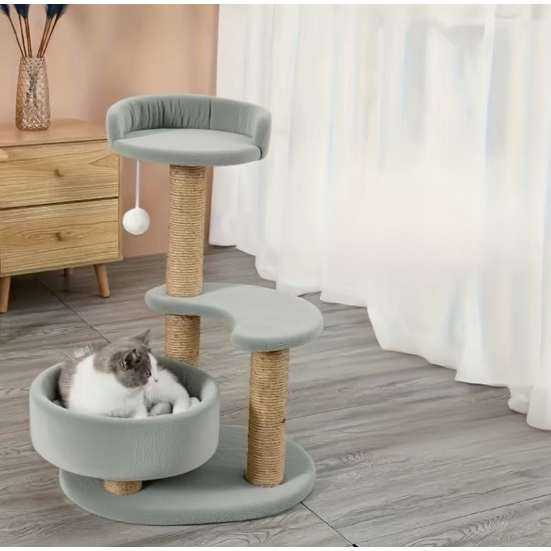 Multi-tiered cat tree with scratching posts and interactive ball toy