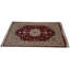 Necdet Oriental Area Rug in Burgundy