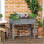 Lit de jardin surélevé avec pieds Outsunny, 34 po x 18 po x 30 po, bac à fleurs surélevé en bois, auto-drainant avec doublure de lit pour les légumes, les herbes et les fleurs dans la cour, patio, balcon, gris foncé