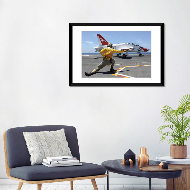 " Shooter Signals To A T-45C Goshawk As It Launches From USS George HW Bush " by Stocktrek Images, 16" H x 24" W x 1" D