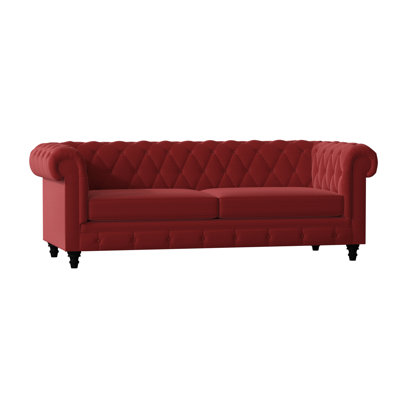 Canapé Chesterfield à accoudoirs roulés