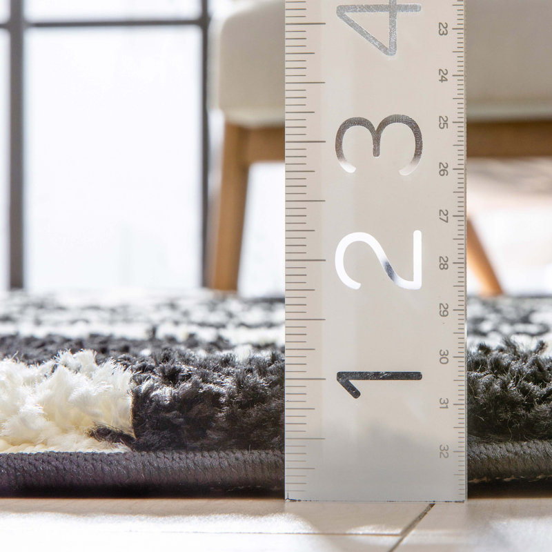 Tapis à motif imprimé animal noir Dondre, Rectangle 3 pi 11 po x 5 pi 3 po