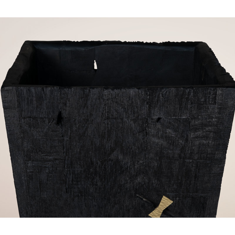 Obsidian Vault Planter ~ A bold interplay of modern form and raw imperfection, this boxy 100% reclaimed wood planter is finished in deep charred black, with dramatic fractures and brass butterfly joinery that turn nature’s flaws into art.