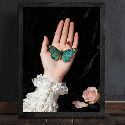 Black Framed Vintage The butterfly falling on the hand Wall Art Retro Style Framed Prints
