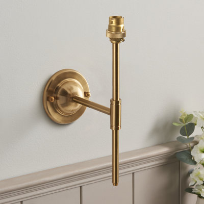 Dome Arc T Bar Wall Fitting finished in Br Aged Brass