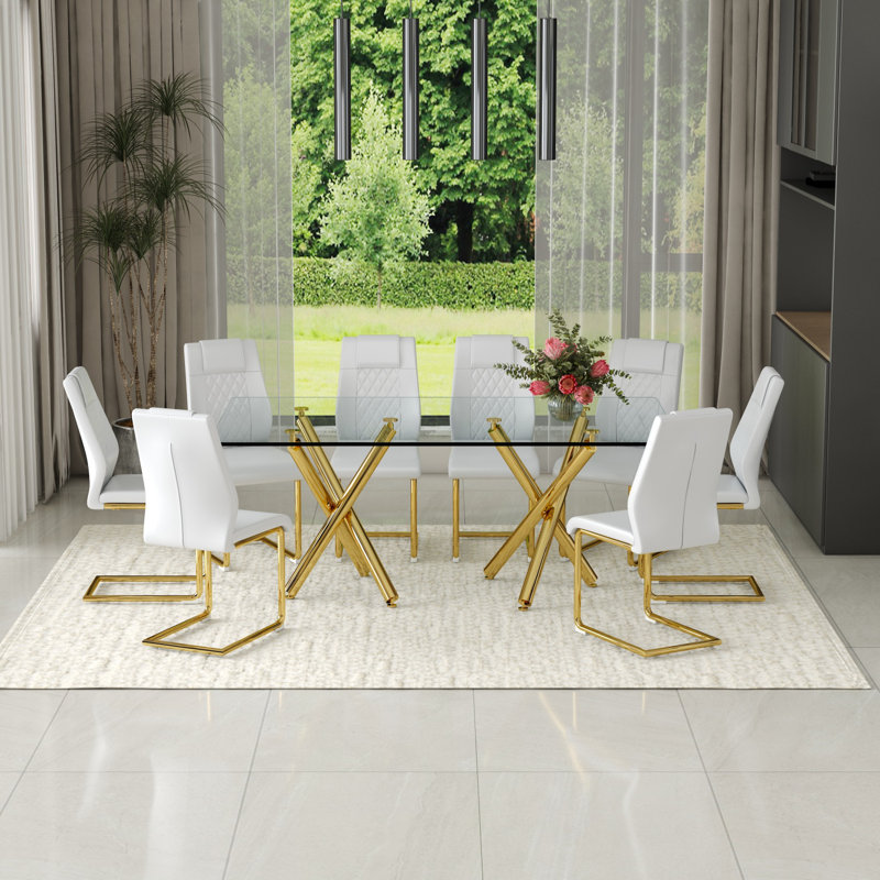 Ensemble de table de salle à manger 71 "moderne en verre rectangulaire avec pieds en métal doré et chaises en polyuréthane